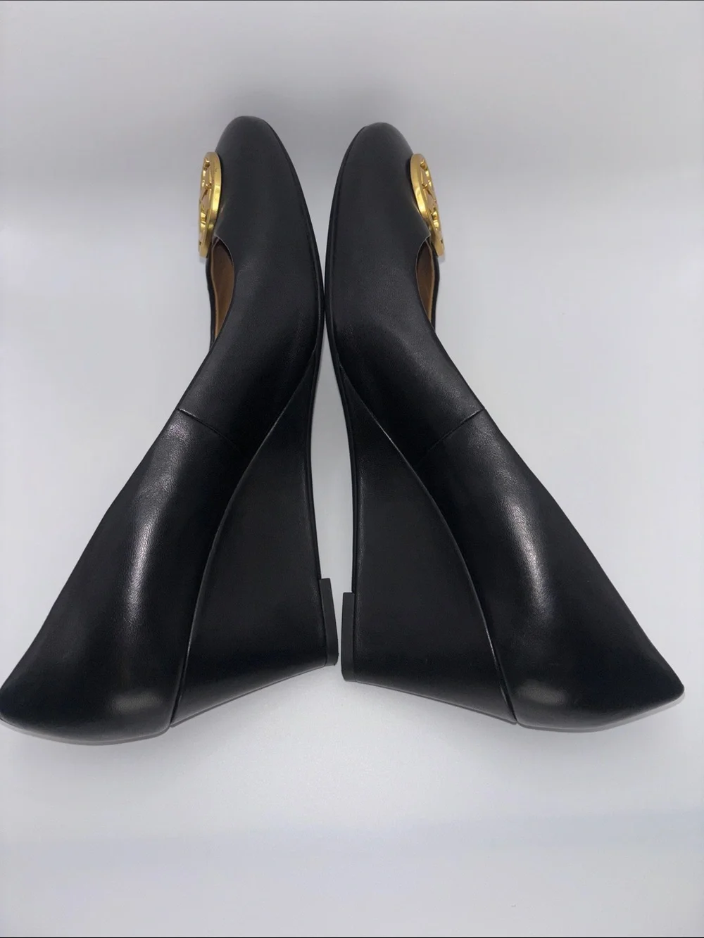 Tory Burch Black Leather Wedges with Gold Logo Medallion